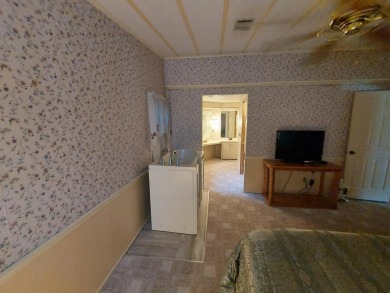 This lovely larger home has had a full roof replacement and All on Lakes at Leesburg Golf Course in Florida - for sale on GolfHomes.com, golf home, golf lot