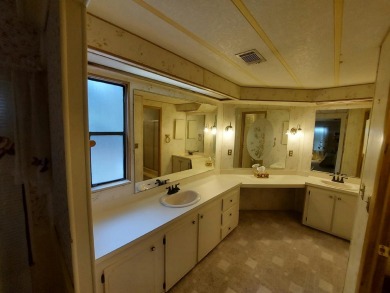 This lovely larger home has had a full roof replacement and All on Lakes at Leesburg Golf Course in Florida - for sale on GolfHomes.com, golf home, golf lot