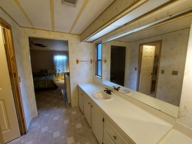 This lovely larger home has had a full roof replacement and All on Lakes at Leesburg Golf Course in Florida - for sale on GolfHomes.com, golf home, golf lot