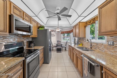 Updates abound in this move-in-ready 2-bed,2-bath,2+car garage on Sun City Riverview Golf Course in Arizona - for sale on GolfHomes.com, golf home, golf lot