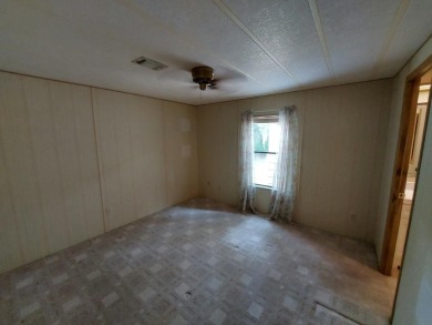This lovely larger home has had a full roof replacement and All on Lakes at Leesburg Golf Course in Florida - for sale on GolfHomes.com, golf home, golf lot