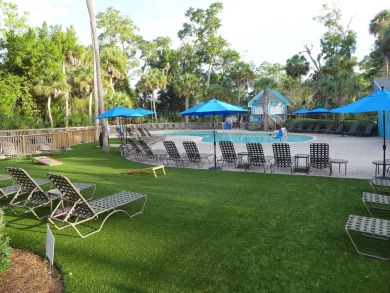 Desirable first floor, 1 BR, 1 BA Driftwood Villa overlooking on The Plantation Course At Edisto in South Carolina - for sale on GolfHomes.com, golf home, golf lot
