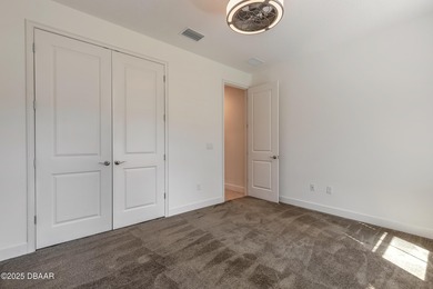 Plantation Bay - This beautifully maintained 2018 ICI-built home on Plantation Bay Golf and Country Club in Florida - for sale on GolfHomes.com, golf home, golf lot