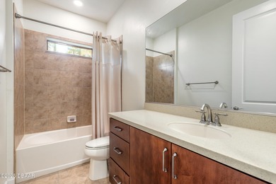 Plantation Bay - This beautifully maintained 2018 ICI-built home on Plantation Bay Golf and Country Club in Florida - for sale on GolfHomes.com, golf home, golf lot