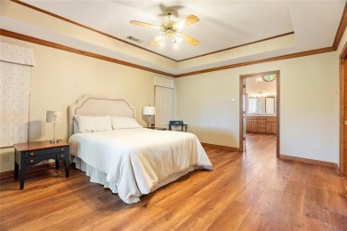 Spanish-style charm shines in this beautiful home set on an on Hillsboro Country Club in Texas - for sale on GolfHomes.com, golf home, golf lot