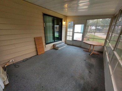This lovely larger home has had a full roof replacement and All on Lakes at Leesburg Golf Course in Florida - for sale on GolfHomes.com, golf home, golf lot