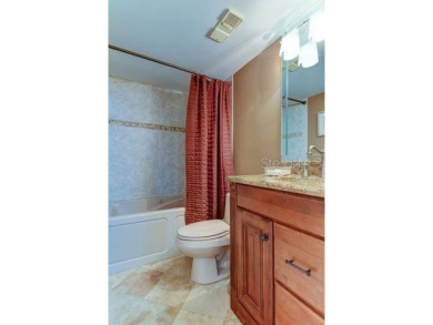 Embrace the epitome of Coastal Living on the 8th floor of this on Isla Del Sol Yacht and Country Club in Florida - for sale on GolfHomes.com, golf home, golf lot