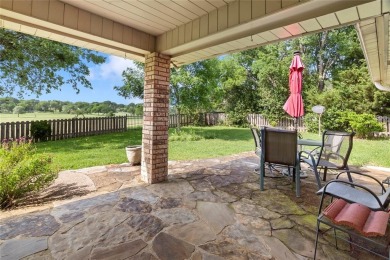 Spanish-style charm shines in this beautiful home set on an on Hillsboro Country Club in Texas - for sale on GolfHomes.com, golf home, golf lot