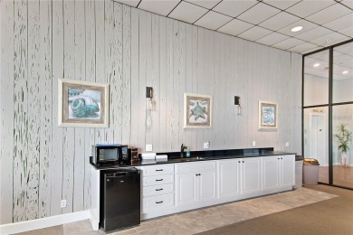 Embrace the epitome of Coastal Living on the 8th floor of this on Isla Del Sol Yacht and Country Club in Florida - for sale on GolfHomes.com, golf home, golf lot