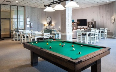 Embrace the epitome of Coastal Living on the 8th floor of this on Isla Del Sol Yacht and Country Club in Florida - for sale on GolfHomes.com, golf home, golf lot