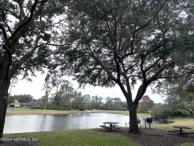 Imagine living in a lushly landscaped community just 8 minutes on Windsor Parke Golf Club in Florida - for sale on GolfHomes.com, golf home, golf lot