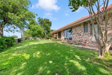 Spanish-style charm shines in this beautiful home set on an on Hillsboro Country Club in Texas - for sale on GolfHomes.com, golf home, golf lot