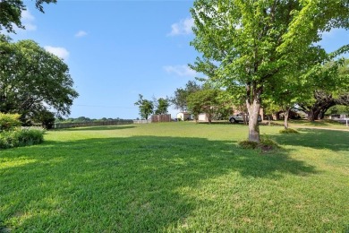 Spanish-style charm shines in this beautiful home set on an on Hillsboro Country Club in Texas - for sale on GolfHomes.com, golf home, golf lot