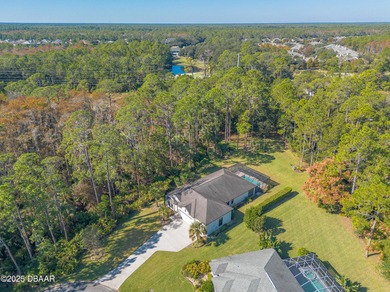 Plantation Bay - This beautifully maintained 2018 ICI-built home on Plantation Bay Golf and Country Club in Florida - for sale on GolfHomes.com, golf home, golf lot