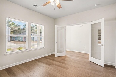 Welcome to this beautifully maintained 4-bedroom, 2.5-bath home on River Oaks Golf Plantation  in South Carolina - for sale on GolfHomes.com, golf home, golf lot