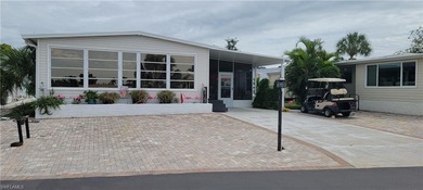 Move in Ready, Many upgrades, long canal view with sunset views on Pelicans Nest Golf Club in Florida - for sale on GolfHomes.com, golf home, golf lot