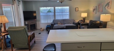 Move in Ready, Many upgrades, long canal view with sunset views on Pelicans Nest Golf Club in Florida - for sale on GolfHomes.com, golf home, golf lot