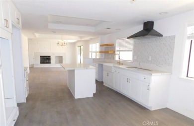 Discover Lakeside Living: Exquisitely Upgraded 6 Bedroom, 3 on Spring Valley Lake Country Club in California - for sale on GolfHomes.com, golf home, golf lot