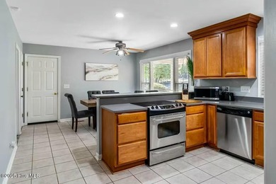 Beautiful brick home overlooking the Foxfire Golf Course with on Foxfire Golf and Country Club in North Carolina - for sale on GolfHomes.com, golf home, golf lot