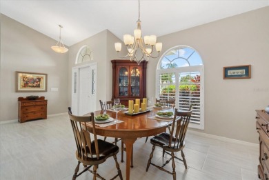 Enjoy stunning lake and golf course views framed by mature trees on Waterford Golf Club in Florida - for sale on GolfHomes.com, golf home, golf lot