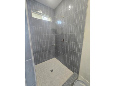 Stunning new construction single-level home situated in a on Big Sugar Golf Club in Arkansas - for sale on GolfHomes.com, golf home, golf lot