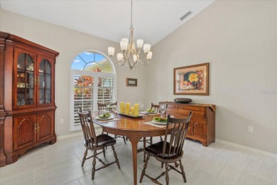 Enjoy stunning lake and golf course views framed by mature trees on Waterford Golf Club in Florida - for sale on GolfHomes.com, golf home, golf lot