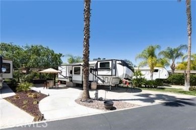 Perfect Little Get-A-Way Oasis. Beautiful Insulated Allumawood on Rancho California RV Resort in California - for sale on GolfHomes.com, golf home, golf lot