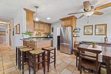 Welcome to your laid-back slice of coastal paradise, nestled on Spessard Holland Golf Course in Florida - for sale on GolfHomes.com, golf home, golf lot