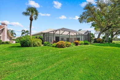 Enjoy stunning lake and golf course views framed by mature trees on Waterford Golf Club in Florida - for sale on GolfHomes.com, golf home, golf lot