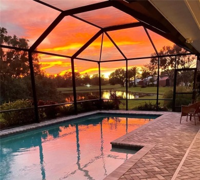 Enjoy stunning lake and golf course views framed by mature trees on Waterford Golf Club in Florida - for sale on GolfHomes.com, golf home, golf lot