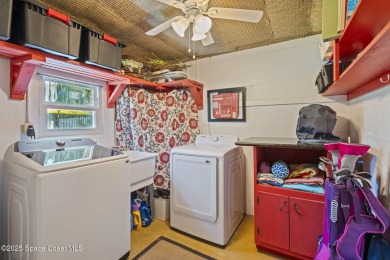 Welcome to your laid-back slice of coastal paradise, nestled on Spessard Holland Golf Course in Florida - for sale on GolfHomes.com, golf home, golf lot