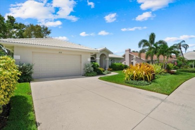 Enjoy stunning lake and golf course views framed by mature trees on Waterford Golf Club in Florida - for sale on GolfHomes.com, golf home, golf lot