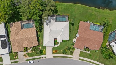 Enjoy stunning lake and golf course views framed by mature trees on Waterford Golf Club in Florida - for sale on GolfHomes.com, golf home, golf lot