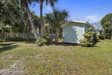 Welcome to your laid-back slice of coastal paradise, nestled on Spessard Holland Golf Course in Florida - for sale on GolfHomes.com, golf home, golf lot