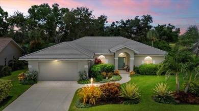 Enjoy stunning lake and golf course views framed by mature trees on Waterford Golf Club in Florida - for sale on GolfHomes.com, golf home, golf lot