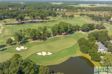 Situated on #10 Deer Creek course with wide open golf and lagoon on The Landings Club - Deer Creek in Georgia - for sale on GolfHomes.com, golf home, golf lot