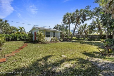 Welcome to your laid-back slice of coastal paradise, nestled on Spessard Holland Golf Course in Florida - for sale on GolfHomes.com, golf home, golf lot