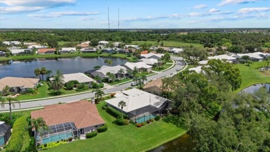 Enjoy stunning lake and golf course views framed by mature trees on Waterford Golf Club in Florida - for sale on GolfHomes.com, golf home, golf lot