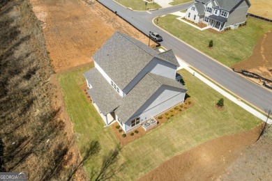 Welcome to your dream home at 3257 Traditions Way, a beautifully on Traditions of Braselton Golf Club in Georgia - for sale on GolfHomes.com, golf home, golf lot