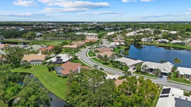 Enjoy stunning lake and golf course views framed by mature trees on Waterford Golf Club in Florida - for sale on GolfHomes.com, golf home, golf lot