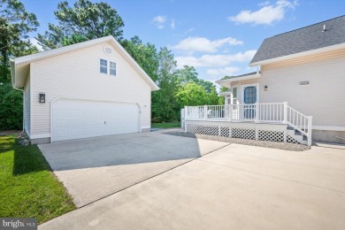Stunning coastal home located just 3 miles to downtown Bethany on Salt Pond Golf Club in Delaware - for sale on GolfHomes.com, golf home, golf lot