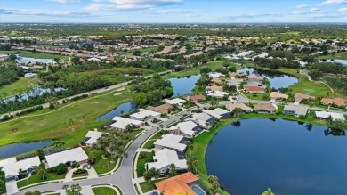 Enjoy stunning lake and golf course views framed by mature trees on Waterford Golf Club in Florida - for sale on GolfHomes.com, golf home, golf lot