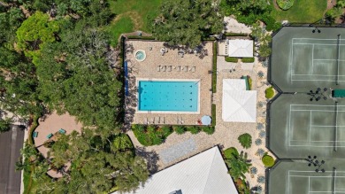 Enjoy stunning lake and golf course views framed by mature trees on Waterford Golf Club in Florida - for sale on GolfHomes.com, golf home, golf lot