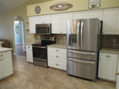 SUPER SIZED HOUSE AND DRIVEWAY, ON A SUPER SIZED LOT !! This on Preserve Golf Club in Florida - for sale on GolfHomes.com, golf home, golf lot