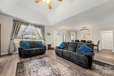 Welcome to 8615 Golf Ridge Drive, an updated ranch-style home on Raintree Country Club in North Carolina - for sale on GolfHomes.com, golf home, golf lot