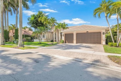 Luxury living awaits in this stunning one-story pool home on the on Weston Hills Country Club in Florida - for sale on GolfHomes.com, golf home, golf lot