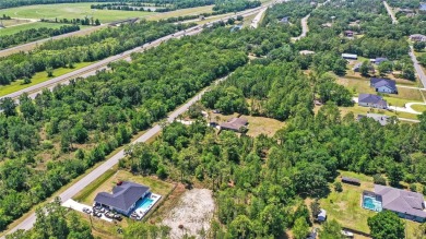 Build your dream home on this expansive 1.24-acre vacant lot on Wedgefield Golf Club in Florida - for sale on GolfHomes.com, golf home, golf lot