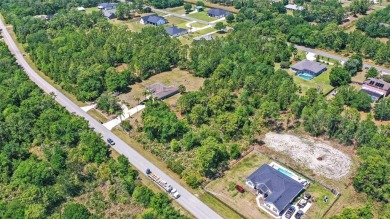 Build your dream home on this expansive 1.24-acre vacant lot on Wedgefield Golf Club in Florida - for sale on GolfHomes.com, golf home, golf lot