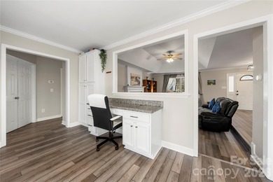 Welcome to 8615 Golf Ridge Drive, an updated ranch-style home on Raintree Country Club in North Carolina - for sale on GolfHomes.com, golf home, golf lot