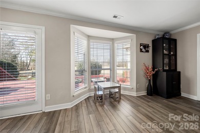 Welcome to 8615 Golf Ridge Drive, an updated ranch-style home on Raintree Country Club in North Carolina - for sale on GolfHomes.com, golf home, golf lot